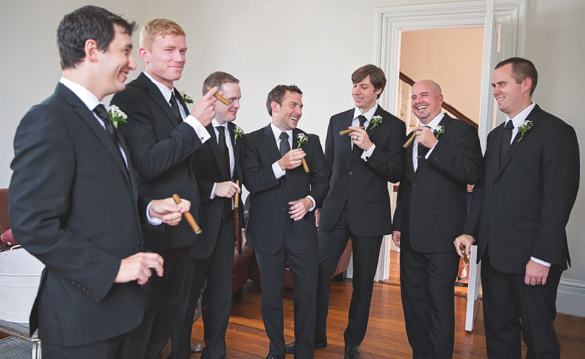 Wedding Party Groomsmen Enjoying Cigars
